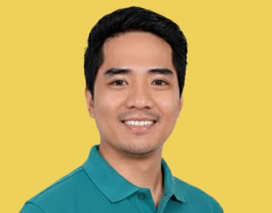 Noel Minoza Headshot Business Casual Yellow